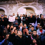 Tunisia, Tunis
Men pray outside the National Theatre at the end of a demonstration.