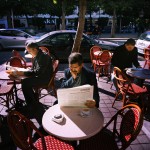 Tunisia, Tunis
Men sit at a cafe reading newspapers.