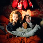 Romania, Bucharest. Corina and her brother Claudiu eating dinner.