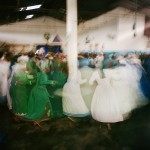 Mozambique, Maputo.
Adherants of a Zion church dance together during a ritual ceremony in the church hall.